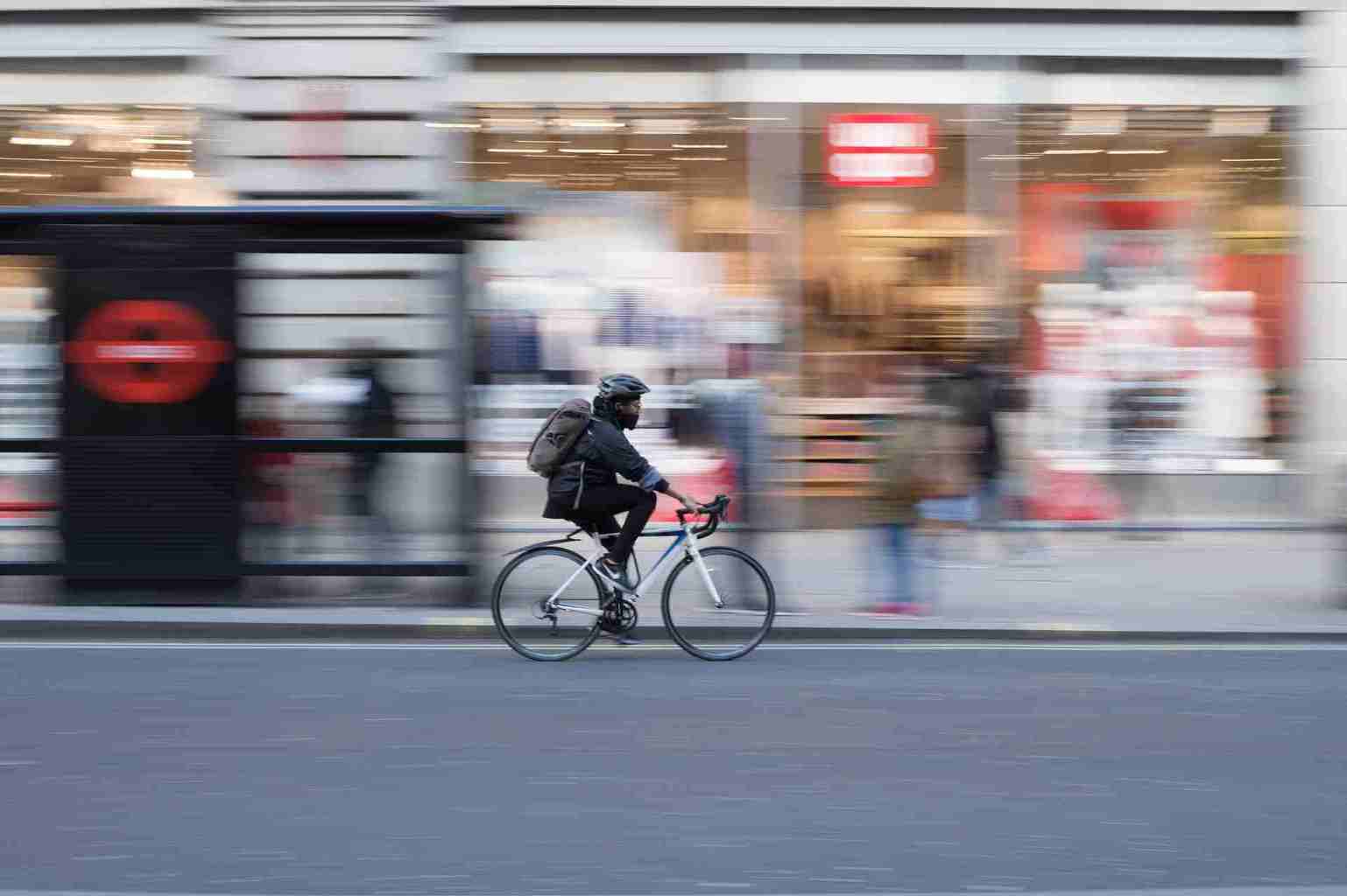 Commuter cycling through London.